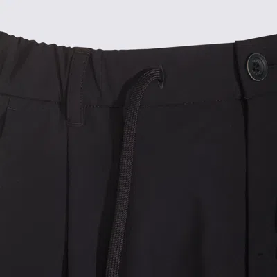 Herno Trousers With Back Pockets And Button Detail In Black