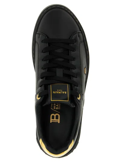 Balmain Sneakers 'court' Gold-tone Detail In Black