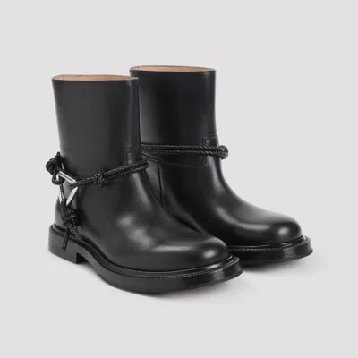 Bottega Veneta Women Black Ankle Boots With Metallic Detail On The Side And Applied Laces In Leather In Animal Print