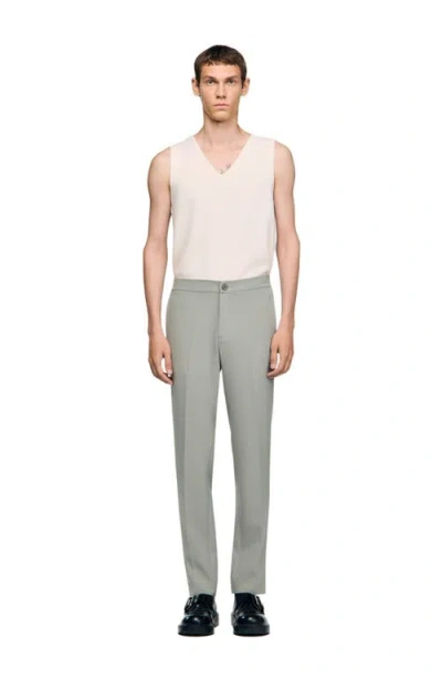 Sandro Jersey Trousers In Green