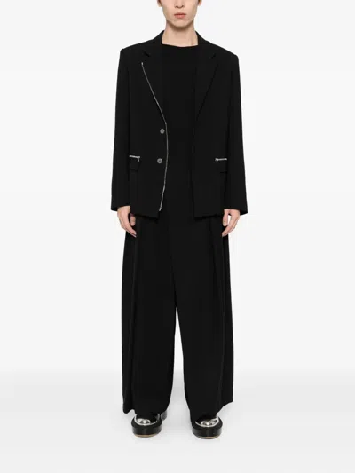 Songzio Asymmetric-wrap Trousers In Black