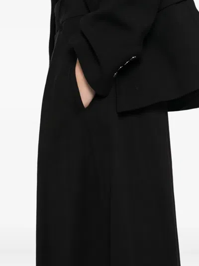 Songzio Asymmetric-wrap Trousers In Black