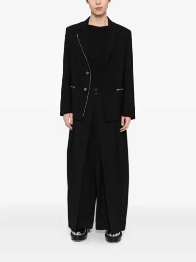 Songzio Pleated Trousers In Black
