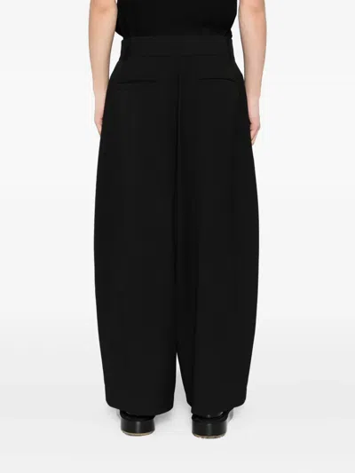 Songzio Pleated Trousers In Black