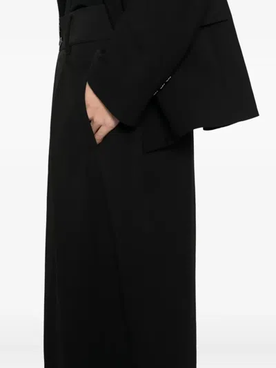 Songzio Pleated Trousers In Black