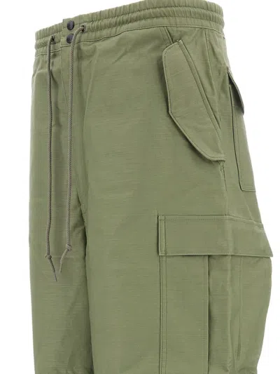 Junya Watanabe Cargo-style Pants With Adjustable Drawstring In Green