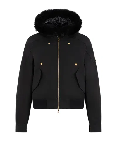 Moose Knuckles Fitted Hooded Jacket With Plush Fur Trim And Metallic Accents In Black