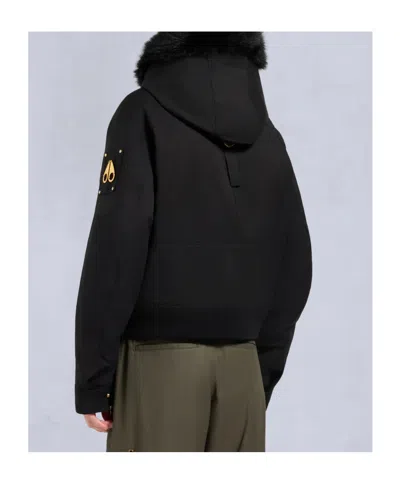 Moose Knuckles Fitted Hooded Jacket With Plush Fur Trim And Metallic Accents In Black