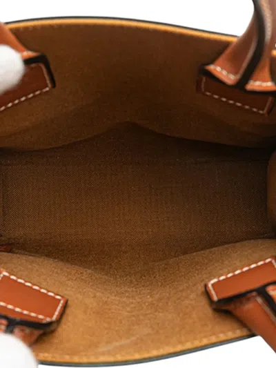 Pre-owned Celine 2021-2025 Mini Triomphe Coated Canvas Vertical Cabas Satchel In Brown