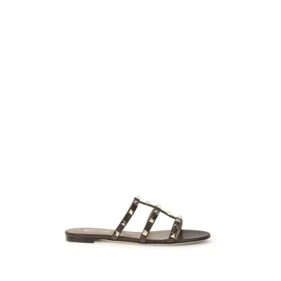 Valentino Rockstud Flat Sandals In Brown