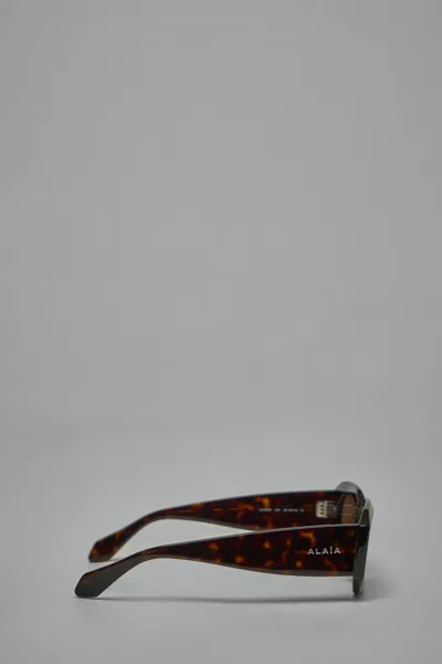 Alaïa Rectangular Sunglasses In Brown