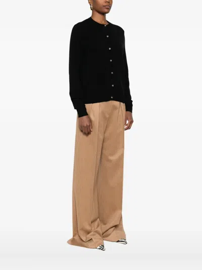 Soft Goat Buttoned Crew Neck Sweater In Black