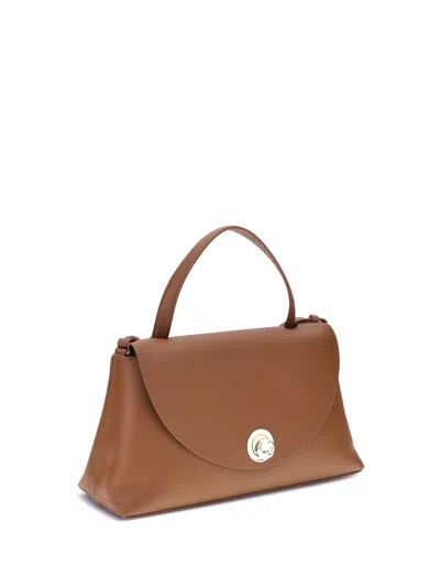 Coccinelle Curved Top Handbag With Circular Detail And Detachable Shoulder Strap In Brown