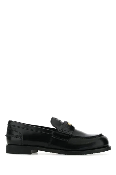Miu Miu Perforated Coin-detail Loafers In Black