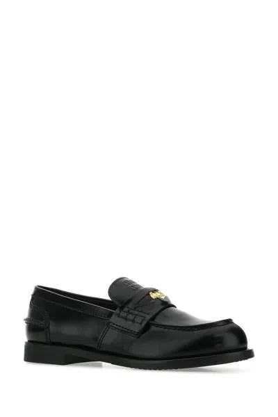 Miu Miu Perforated Coin-detail Loafers In Black