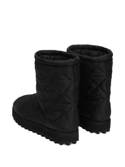 Dolce & Gabbana Diamond Quilted Flat Sole Ankle Boots In Black