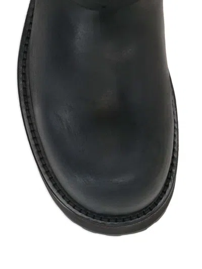 Balenciaga Venom Boots In Worn-out Effect Leather Shoes In Black