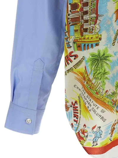 Comme Des Garçons Asymmetric Hem Shirt With Vibrant Landmark Prints In Blue