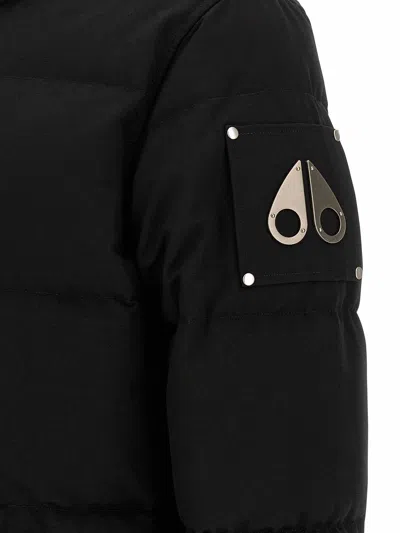 Moose Knuckles Forrestville Black Down Jacket With Fixed Hood And Logo Patch On The Sleeve In Cotton Blend Man In Black