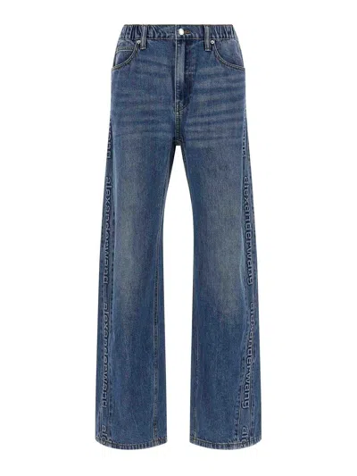 Alexander Wang Embossed Logo Jeans In Blue