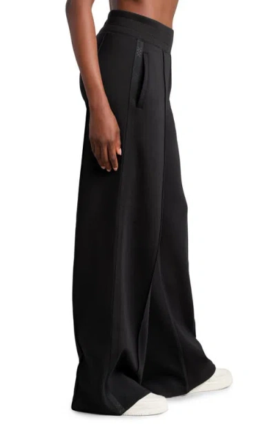 Rhone Dreamglow Trousers In Black