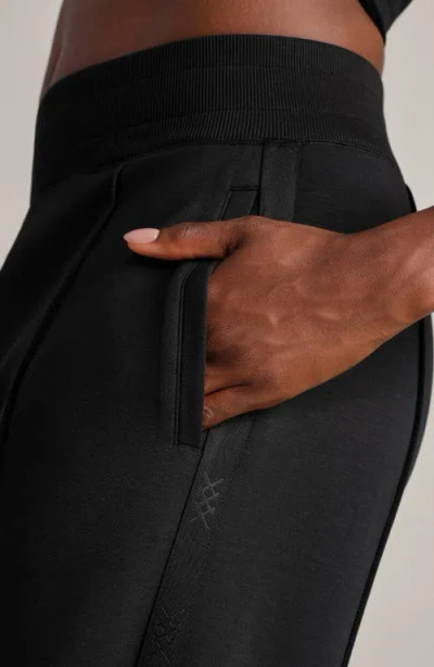 Rhone Dreamglow Trousers In Black