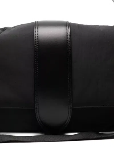 Jacquemus The Messenger Bambino Bag With Adjustable Shoulder Strap In Black