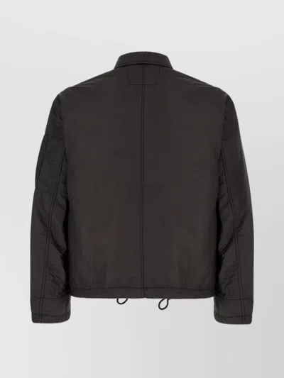 C.p. Company Synthetic Leather Jacket Featuring Pockets In Brown