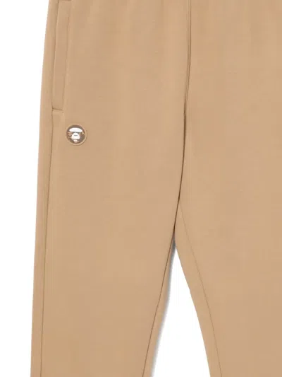 Aape By A Bathing Ape Moonface Track Trousers In Neutral