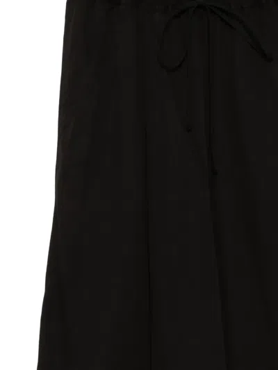 Julius Over-wrapping Shorts In Black