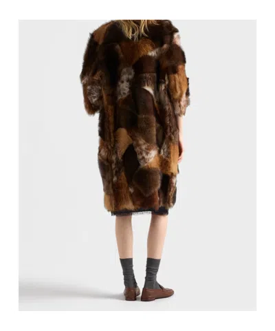 Prada Patchwork Shearling Coat In Brown