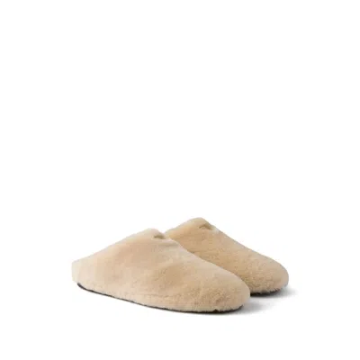 Prada Triangle-logo Shearling Mules In Neutral