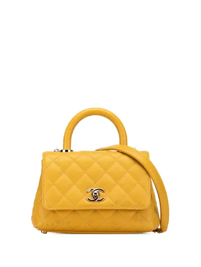 Pre-owned Chanel 2021-2025 Extra Mini Quilted Caviar Coco Top Handle Bag Satchel In Yellow