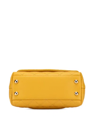 Pre-owned Chanel 2021-2025 Extra Mini Quilted Caviar Coco Top Handle Bag Satchel In Yellow