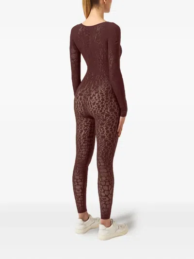 Wolford Python-pattern Long-sleeve Jumpsuit In Brown
