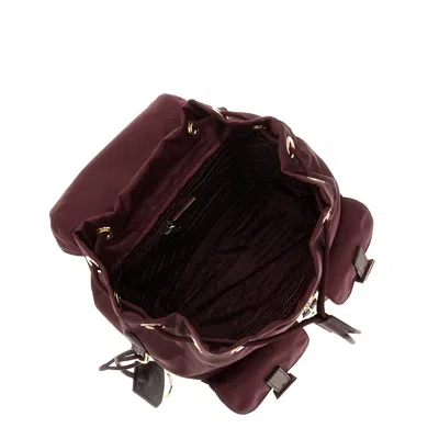 Prada Bordeaux Re-nylon Backpack With Golden Hardware In Red