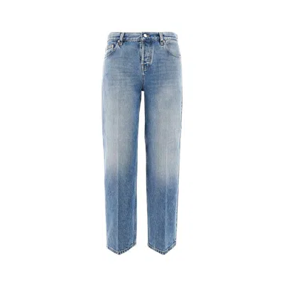 Gucci Blue Jeans With Logo Patch On The Rear And Faded Effect In Denim Woman
