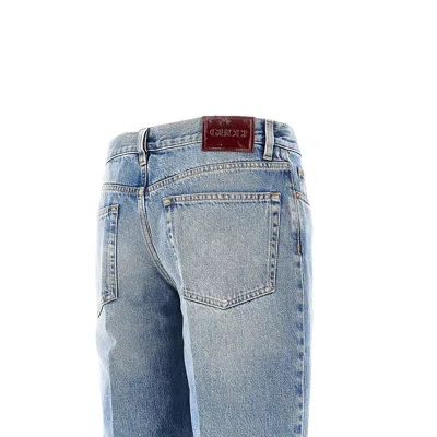 Gucci Blue Jeans With Logo Patch On The Rear And Faded Effect In Denim Woman