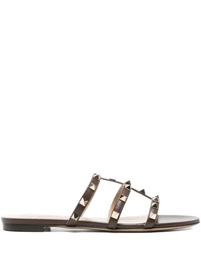 Valentino Rockstud Slide Sandal In Laminated Nappa With Cabochon In Brown