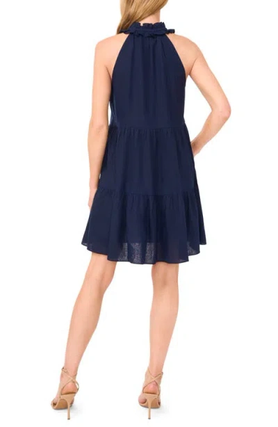 Cece Clip Dot Flutter Sleeve Midi Dress In Blue