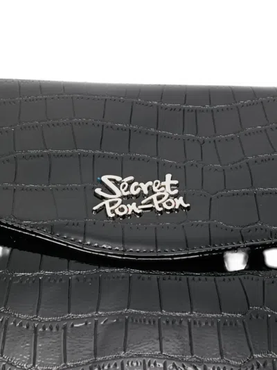 Secret Pon-pon Crocodile-embossed Logo-plaque Clutch Bag In Black