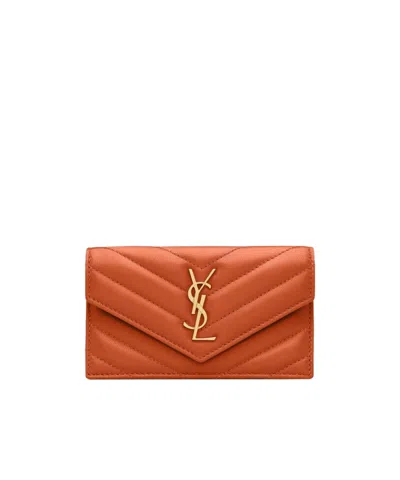 Saint Laurent Leather Cassandre Fragments Flap Card Holder In Brown