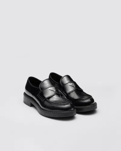 Prada Triangle Logo Brushed Leather Loafers In Black