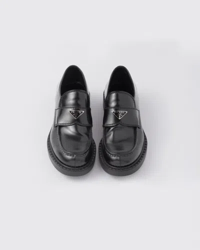 Prada Triangle Logo Brushed Leather Loafers In Black