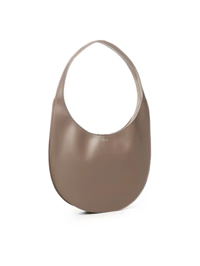 Coperni Medium Soft Swipe Shoulder Bag With Rounded Silhouette In Brown
