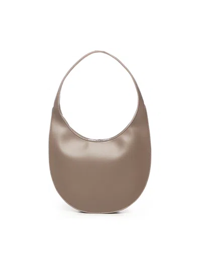 Coperni Medium Soft Swipe Shoulder Bag With Rounded Silhouette In Brown