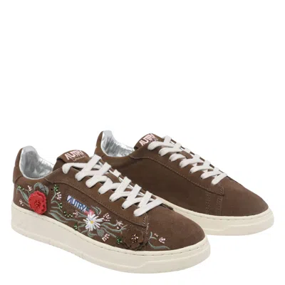 Autry Low-top Sneakers With Floral Embroidery In Rich Brown In Brown