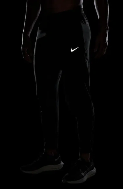 Nike Stride Dri-fit Woven Running Pants In Black