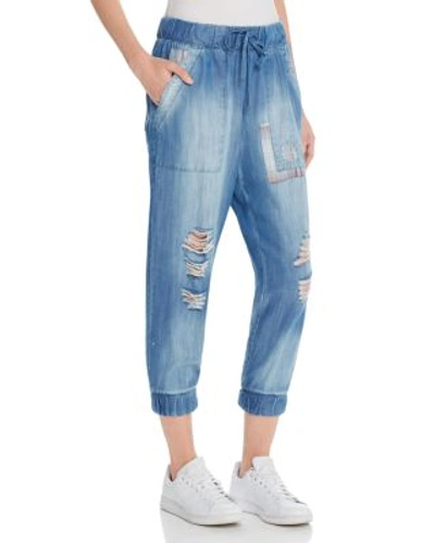 Shop Bella Dahl Distressed Chambray Jogger Pants In Ripped Wash