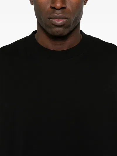 Represent "initial Oversized" T-shirt Clothing In Black